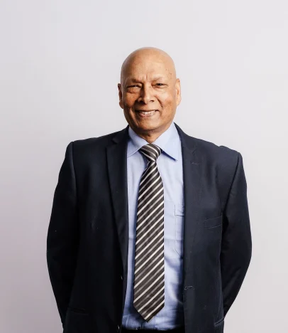 Smiling man in suit and striped tie